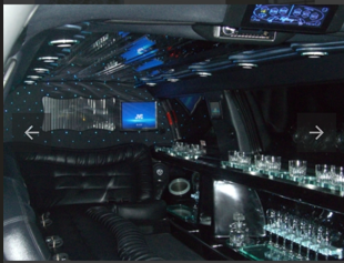 Stretch limousine interior with bar and LED lighting