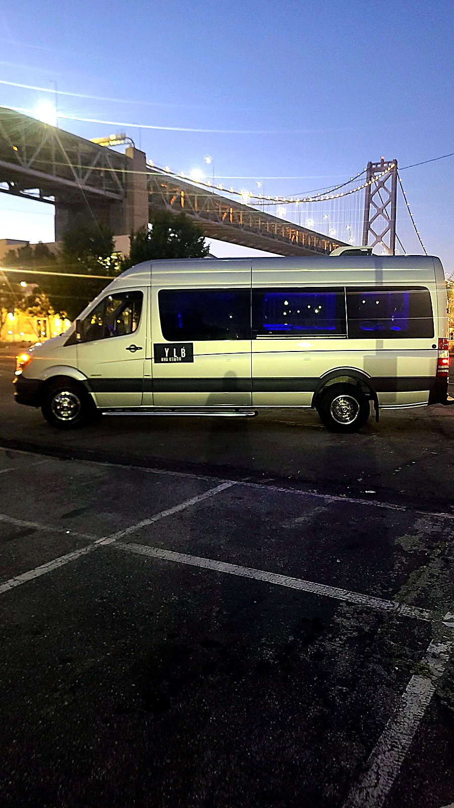 White limo bus exterior — wine country transportation