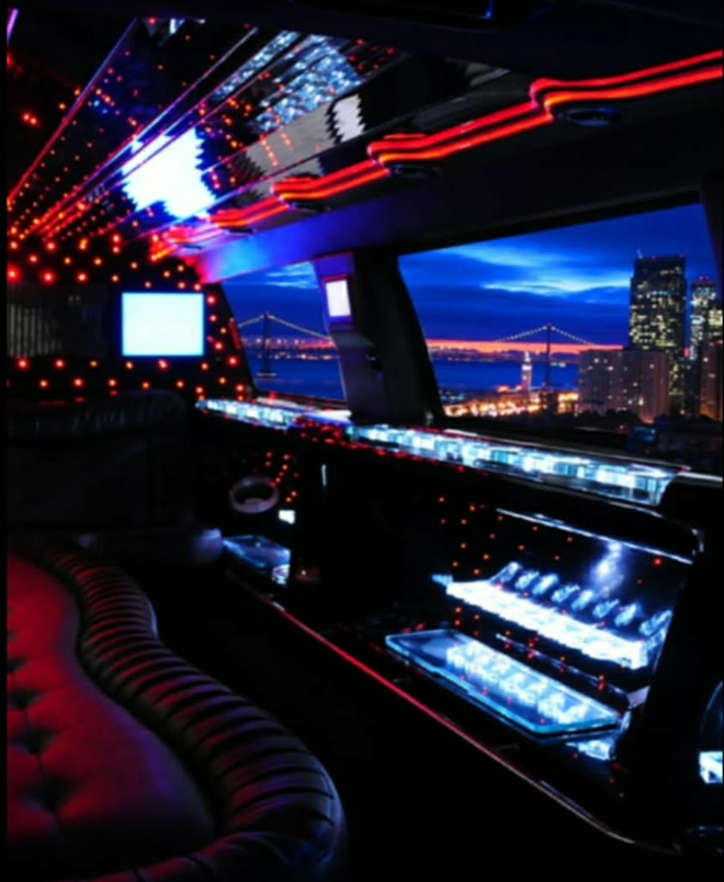 Stretch limousine interior with LED lighting and a Bay skyline view